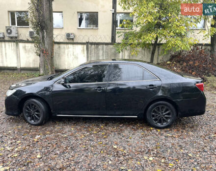 Черный Тойота Камри, объемом двигателя 2.36 л и пробегом 230 тыс. км за 10250 $, фото 7 на Automoto.ua