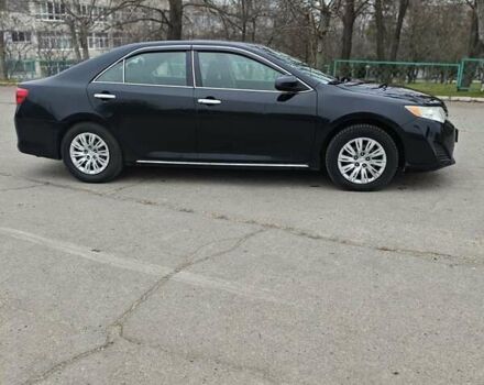 Чорний Тойота Камрі, об'ємом двигуна 2.5 л та пробігом 189 тис. км за 11500 $, фото 4 на Automoto.ua