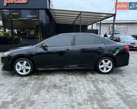 Черный Тойота Камри, объемом двигателя 2.49 л и пробегом 230 тыс. км за 13200 $, фото 1 на Automoto.ua