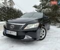 Черный Тойота Камри, объемом двигателя 2.49 л и пробегом 190 тыс. км за 12400 $, фото 1 на Automoto.ua