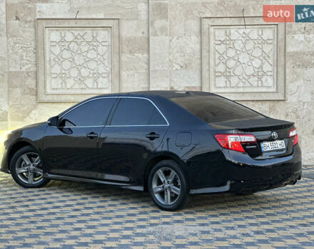 Черный Тойота Камри, объемом двигателя 2.5 л и пробегом 215 тыс. км за 11950 $, фото 17 на Automoto.ua