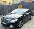 Черный Тойота Камри, объемом двигателя 2.5 л и пробегом 255 тыс. км за 13500 $, фото 1 на Automoto.ua