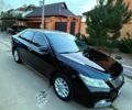 Черный Тойота Камри, объемом двигателя 2.5 л и пробегом 173 тыс. км за 14550 $, фото 1 на Automoto.ua