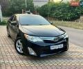 Черный Тойота Камри, объемом двигателя 2.49 л и пробегом 259 тыс. км за 7900 $, фото 1 на Automoto.ua