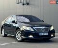 Черный Тойота Камри, объемом двигателя 2.5 л и пробегом 235 тыс. км за 13850 $, фото 1 на Automoto.ua