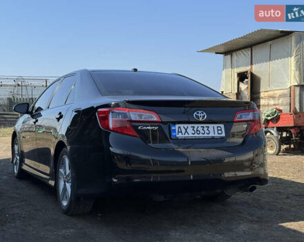 Чорний Тойота Камрі, об'ємом двигуна 2.49 л та пробігом 245 тис. км за 12200 $, фото 3 на Automoto.ua