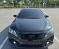 Черный Тойота Камри, объемом двигателя 2.5 л и пробегом 238 тыс. км за 14700 $, фото 1 на Automoto.ua