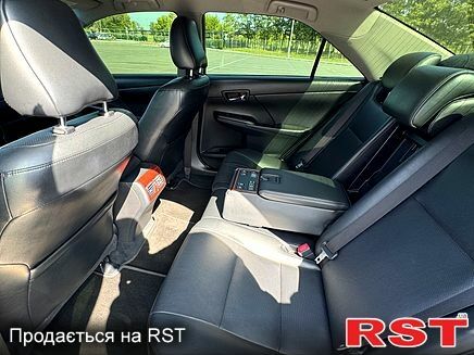 Черный Тойота Камри, объемом двигателя 2.5 л и пробегом 238 тыс. км за 14700 $, фото 5 на Automoto.ua