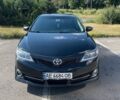 Черный Тойота Камри, объемом двигателя 2.5 л и пробегом 203 тыс. км за 12300 $, фото 1 на Automoto.ua