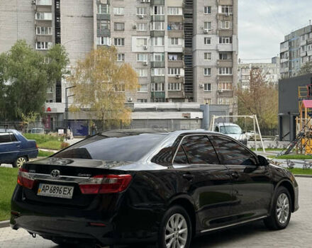 Черный Тойота Камри, объемом двигателя 2.5 л и пробегом 142 тыс. км за 13400 $, фото 3 на Automoto.ua