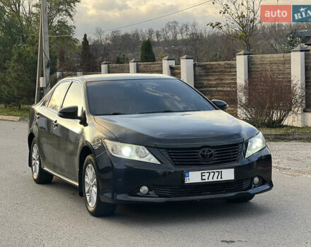 Чорний Тойота Камрі, об'ємом двигуна 2.5 л та пробігом 227 тис. км за 10500 $, фото 1 на Automoto.ua