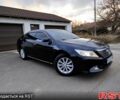 Черный Тойота Камри, объемом двигателя 2.5 л и пробегом 167 тыс. км за 13300 $, фото 1 на Automoto.ua