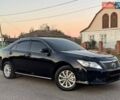 Черный Тойота Камри, объемом двигателя 2.49 л и пробегом 178 тыс. км за 12350 $, фото 1 на Automoto.ua