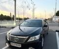 Черный Тойота Камри, объемом двигателя 2.5 л и пробегом 125 тыс. км за 14500 $, фото 1 на Automoto.ua
