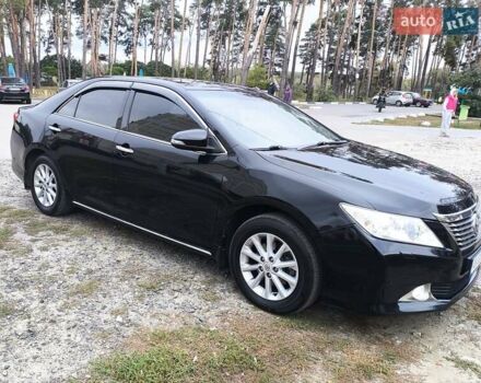 Черный Тойота Камри, объемом двигателя 2.5 л и пробегом 205 тыс. км за 14300 $, фото 5 на Automoto.ua