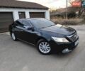 Черный Тойота Камри, объемом двигателя 2.49 л и пробегом 163 тыс. км за 13300 $, фото 1 на Automoto.ua