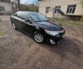 Чорний Тойота Камрі, об'ємом двигуна 2.5 л та пробігом 230 тис. км за 9999 $, фото 1 на Automoto.ua