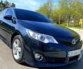 Черный Тойота Камри, объемом двигателя 2.5 л и пробегом 280 тыс. км за 11000 $, фото 1 на Automoto.ua