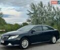 Чорний Тойота Камрі, об'ємом двигуна 2.5 л та пробігом 180 тис. км за 14440 $, фото 1 на Automoto.ua