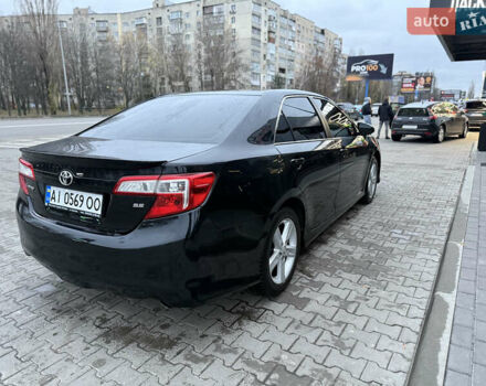 Черный Тойота Камри, объемом двигателя 2.49 л и пробегом 230 тыс. км за 13200 $, фото 4 на Automoto.ua