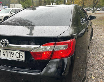 Черный Тойота Камри, объемом двигателя 2.36 л и пробегом 230 тыс. км за 10250 $, фото 12 на Automoto.ua
