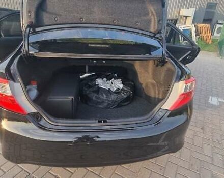 Черный Тойота Камри, объемом двигателя 2.49 л и пробегом 255 тыс. км за 13400 $, фото 17 на Automoto.ua