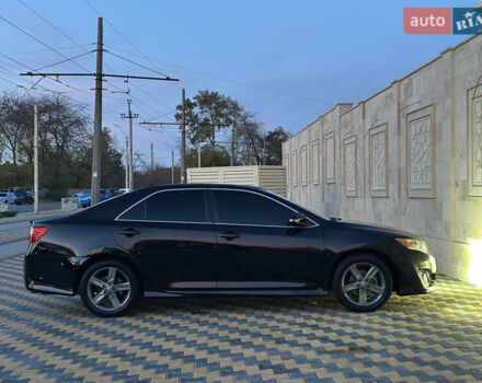 Черный Тойота Камри, объемом двигателя 2.5 л и пробегом 215 тыс. км за 11950 $, фото 14 на Automoto.ua