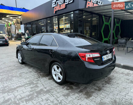 Черный Тойота Камри, объемом двигателя 2.49 л и пробегом 230 тыс. км за 13200 $, фото 2 на Automoto.ua