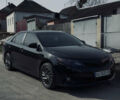 Чорний Тойота Камрі, об'ємом двигуна 2.49 л та пробігом 245 тис. км за 12200 $, фото 1 на Automoto.ua