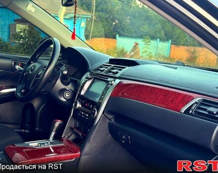 Черный Тойота Камри, объемом двигателя 2.5 л и пробегом 178 тыс. км за 12350 $, фото 6 на Automoto.ua