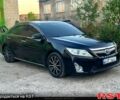 Черный Тойота Камри, объемом двигателя 2.5 л и пробегом 255 тыс. км за 10499 $, фото 1 на Automoto.ua