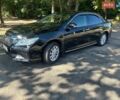 Черный Тойота Камри, объемом двигателя 2.5 л и пробегом 230 тыс. км за 13000 $, фото 1 на Automoto.ua