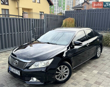 Черный Тойота Камри, объемом двигателя 2.5 л и пробегом 255 тыс. км за 13500 $, фото 1 на Automoto.ua