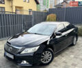 Черный Тойота Камри, объемом двигателя 2.5 л и пробегом 255 тыс. км за 13500 $, фото 1 на Automoto.ua
