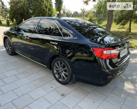 Черный Тойота Камри, объемом двигателя 2.5 л и пробегом 185 тыс. км за 16700 $, фото 35 на Automoto.ua