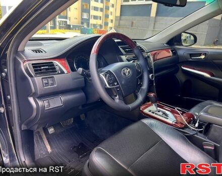 Чорний Тойота Камрі, об'ємом двигуна 2.5 л та пробігом 250 тис. км за 13500 $, фото 6 на Automoto.ua