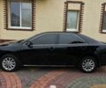 Чорний Тойота Камрі, об'ємом двигуна 2.5 л та пробігом 215 тис. км за 14000 $, фото 5 на Automoto.ua