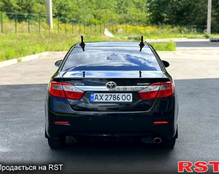 Чорний Тойота Камрі, об'ємом двигуна 2.5 л та пробігом 250 тис. км за 13500 $, фото 4 на Automoto.ua