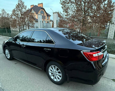 Черный Тойота Камри, объемом двигателя 2.5 л и пробегом 173 тыс. км за 13350 $, фото 8 на Automoto.ua