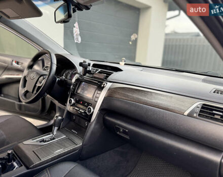 Черный Тойота Камри, объемом двигателя 2.5 л и пробегом 255 тыс. км за 13500 $, фото 30 на Automoto.ua