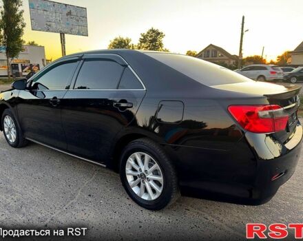 Черный Тойота Камри, объемом двигателя 2.5 л и пробегом 178 тыс. км за 12350 $, фото 3 на Automoto.ua