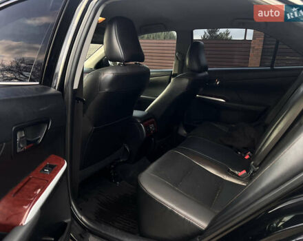 Черный Тойота Камри, объемом двигателя 2.5 л и пробегом 235 тыс. км за 10200 $, фото 6 на Automoto.ua