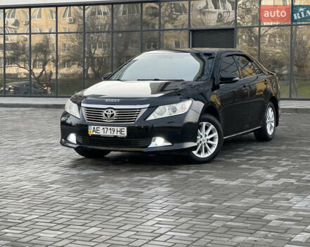 Черный Тойота Камри, объемом двигателя 2.49 л и пробегом 175 тыс. км за 12800 $, фото 1 на Automoto.ua