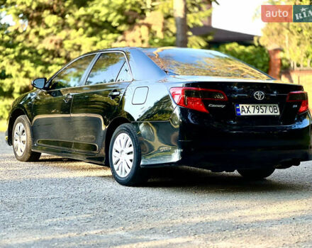 Чорний Тойота Камрі, об'ємом двигуна 2.49 л та пробігом 300 тис. км за 9300 $, фото 2 на Automoto.ua