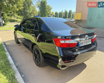 Черный Тойота Камри, объемом двигателя 2.49 л и пробегом 164 тыс. км за 14000 $, фото 2 на Automoto.ua