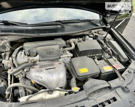 Черный Тойота Камри, объемом двигателя 2.5 л и пробегом 237 тыс. км за 14200 $, фото 19 на Automoto.ua