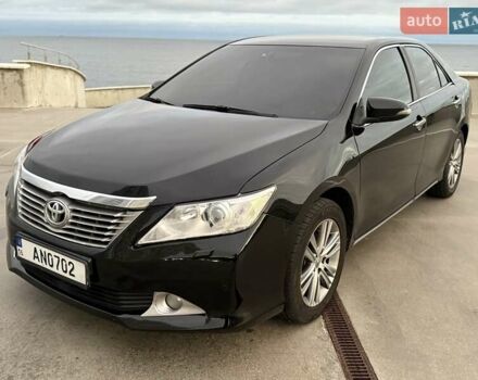 Черный Тойота Камри, объемом двигателя 2.49 л и пробегом 200 тыс. км за 10000 $, фото 1 на Automoto.ua
