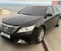 Черный Тойота Камри, объемом двигателя 2.49 л и пробегом 200 тыс. км за 10000 $, фото 1 на Automoto.ua