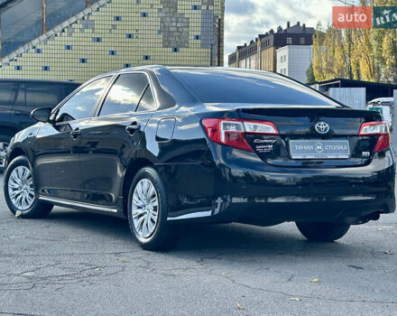 Черный Тойота Камри, объемом двигателя 2.49 л и пробегом 240 тыс. км за 11600 $, фото 4 на Automoto.ua