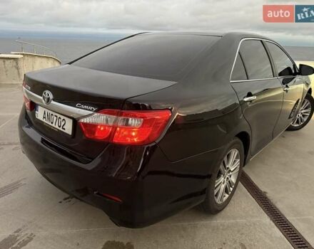 Черный Тойота Камри, объемом двигателя 2.49 л и пробегом 200 тыс. км за 10000 $, фото 10 на Automoto.ua